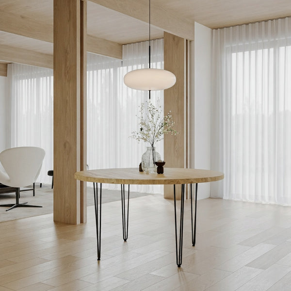 Ronde eiken eettafel in de kleur Pure, massief eiken blad